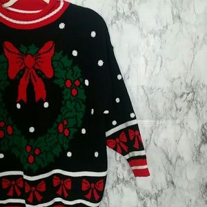 Oversized black "ugly" wreath raglan sweater